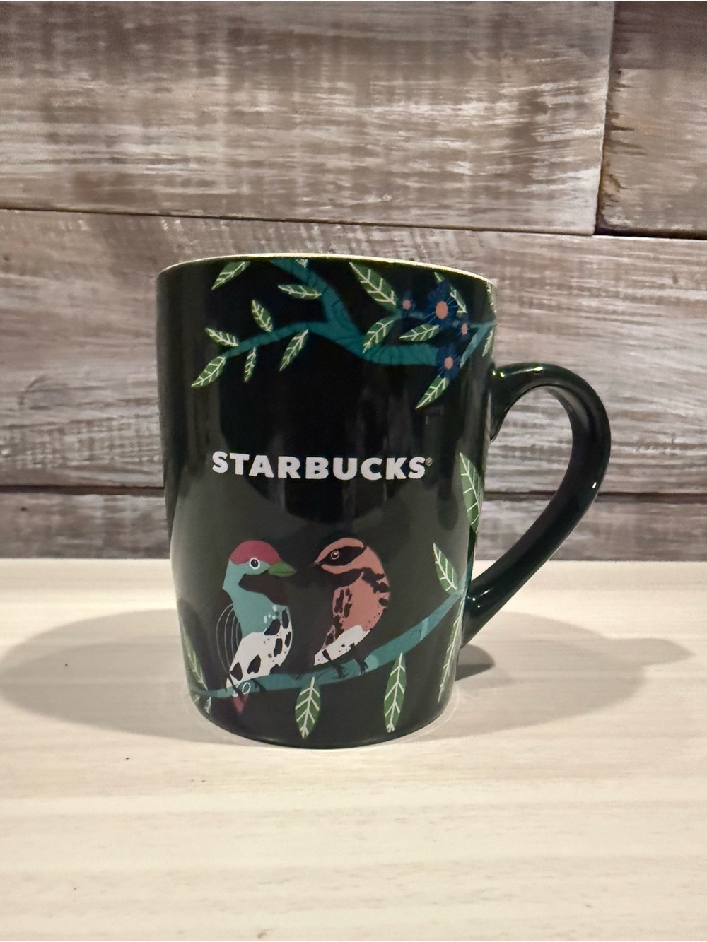 Starbucks Dark Green Ceramic Mug with Colorful Bird Motif